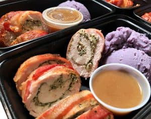 Bacon Wrapped Turkey Medallions filled with Goat Cheese & Spinach.
